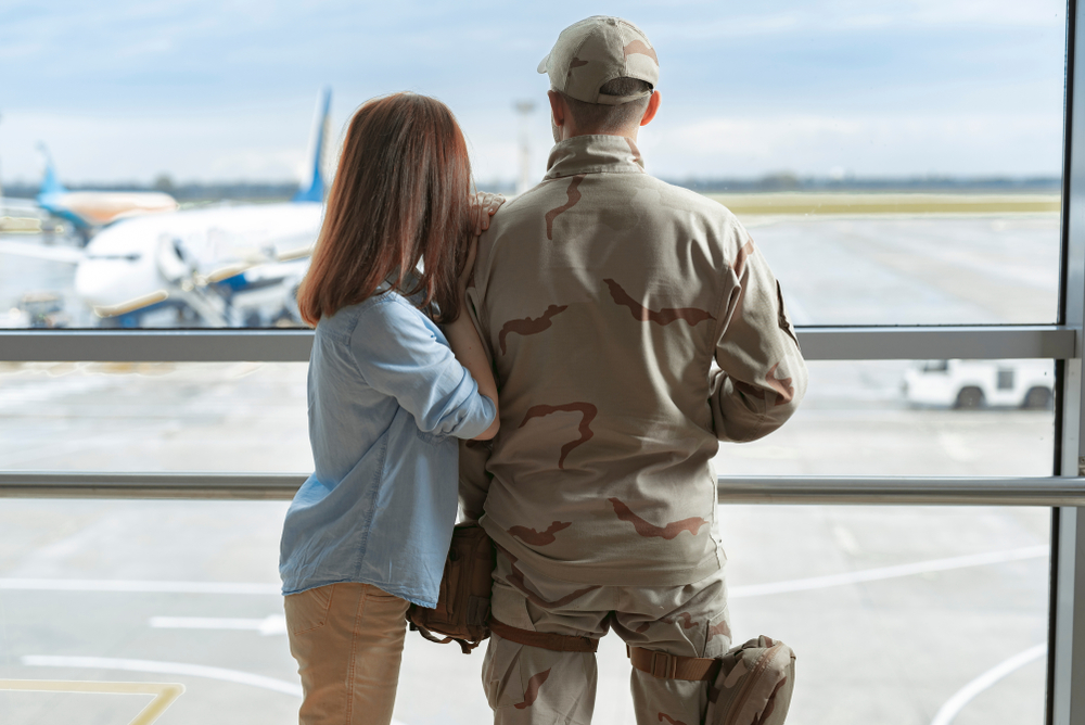 Military Service Member With Wife at the Airport