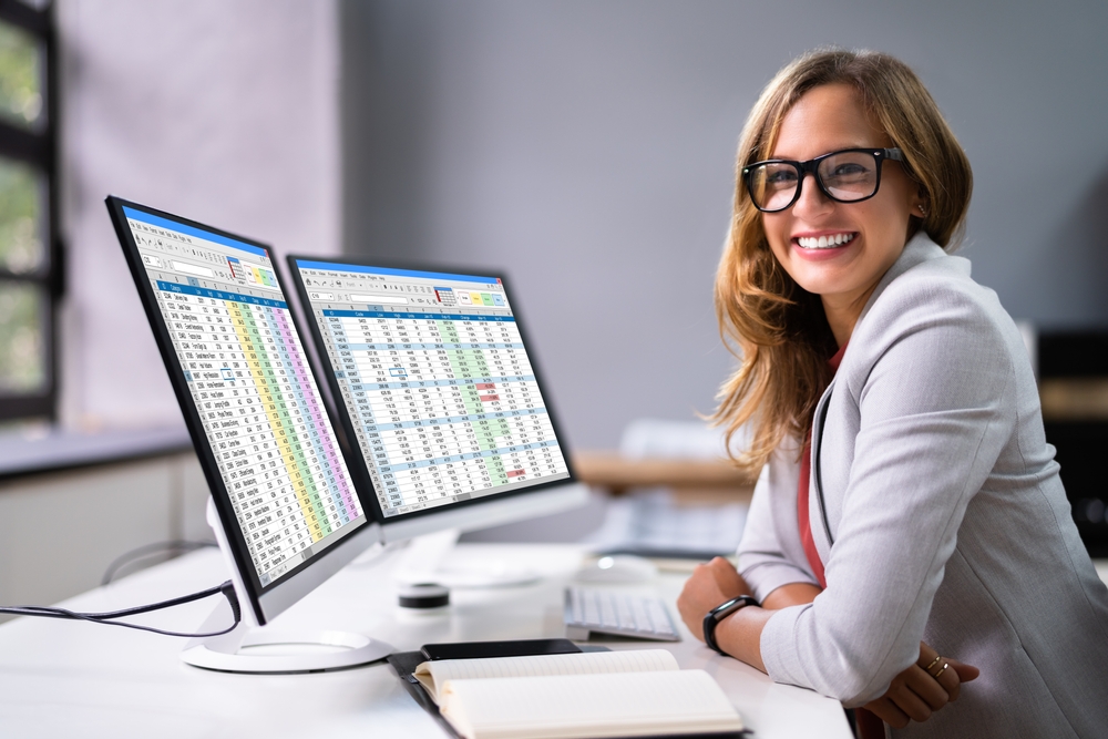 Smiling Woman With Medical Billing and Coding